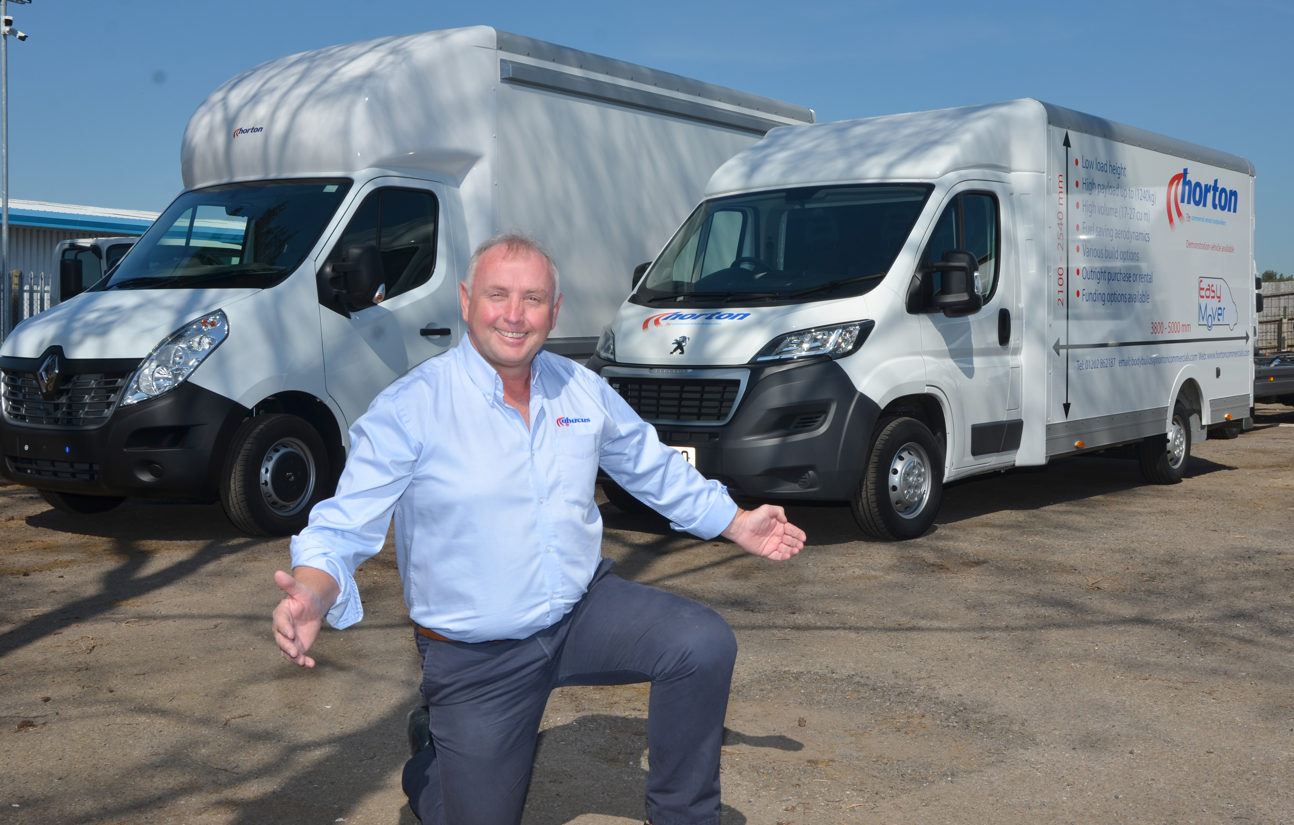 Dave Wolfenden with new Easymover vans Dave Wolfenden with new Easymover vans