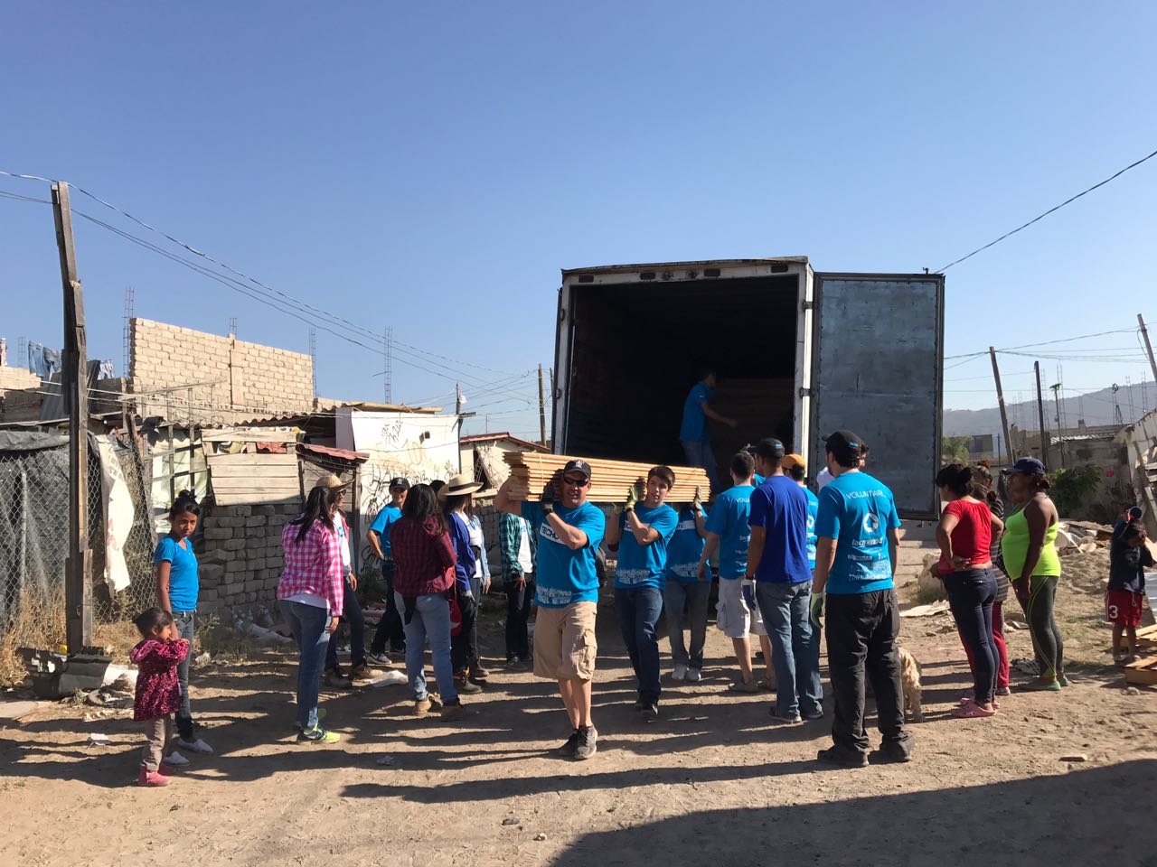 Arpin Strong, helps unload a truck while building homes for the homeless in Guadalajara Mexico.