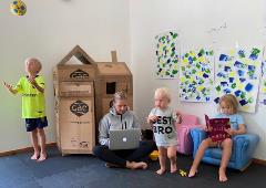 Kids having fun with the GAC playhouse 