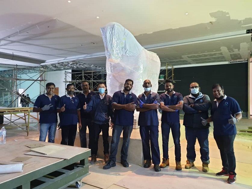 Pioneer Movers prepare to move the Botero statue