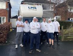 Lee Robinson with members of the LMS team.