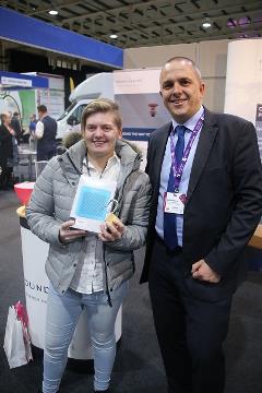 Amanda Robbens receives her prize from Neil Matthews