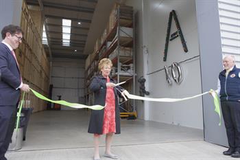 Artist Penny Linton declares the new headquarters officially open