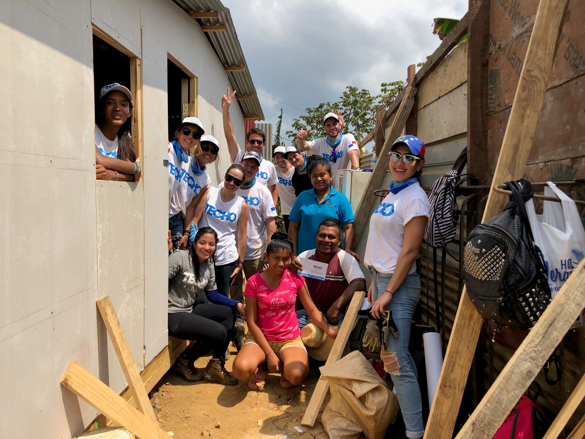 LACMANext volunteers at work with TECHO