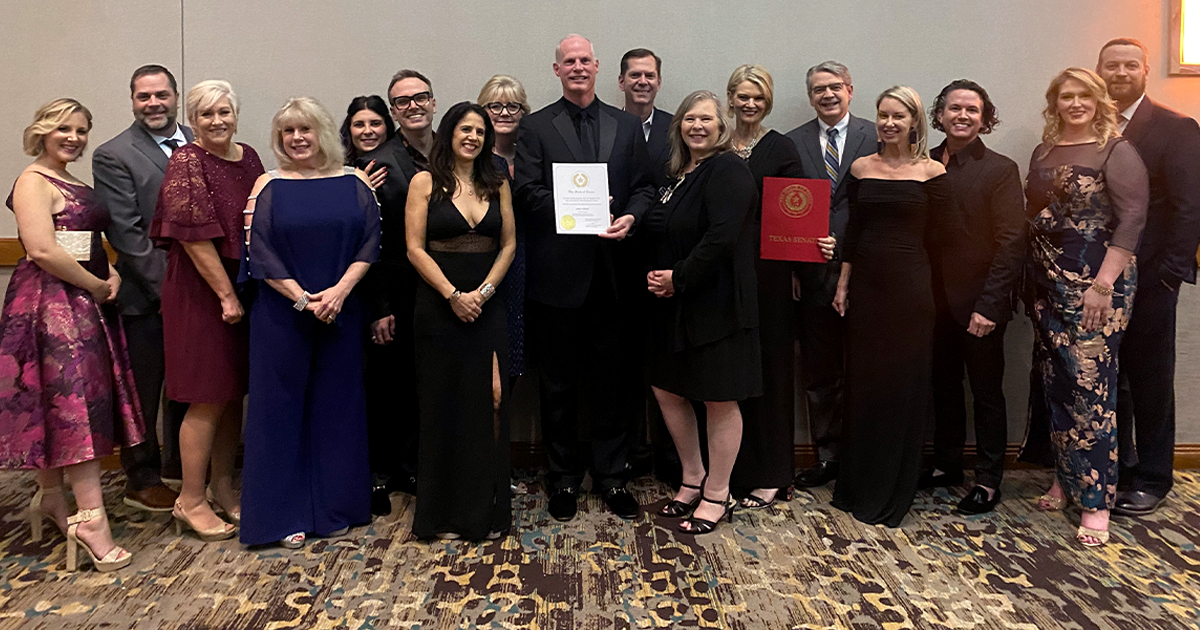 The team at Altair Global accepting the Frisco Chamber of Commerce Employer of the Year Award