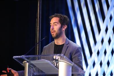 Adam Lowy presenting at the IAM conference Adam Lowy presenting at the IAM conference