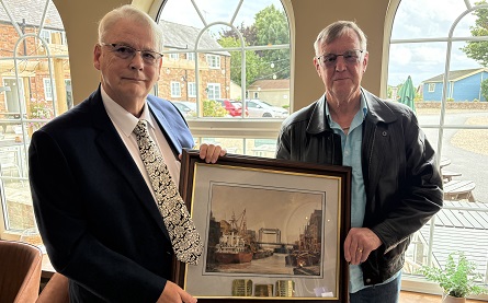 Trevor Kidd makes the presentation to Derek Canfield