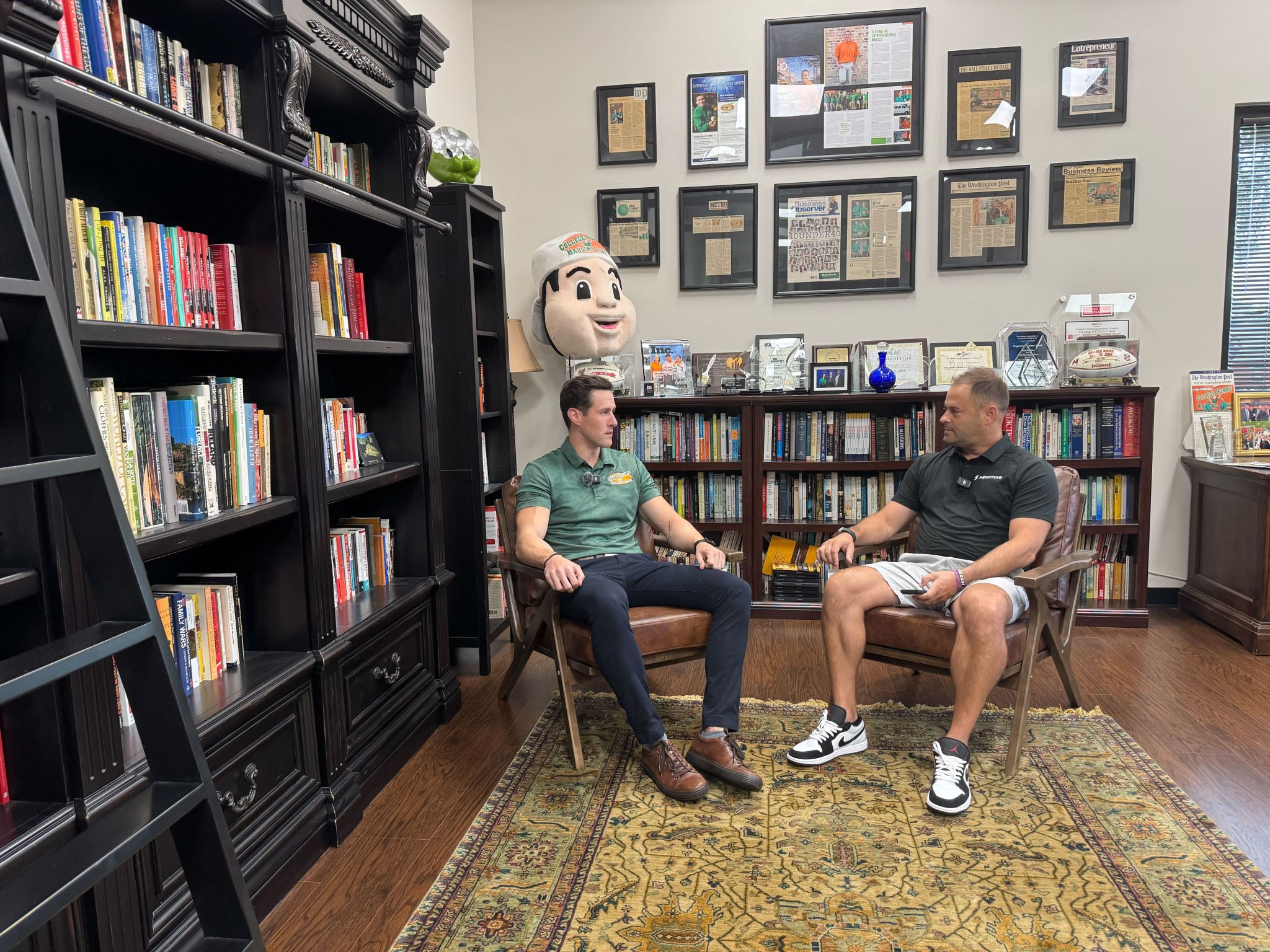 Daniel Whalen (left) runs franchise operations for H.U.N.K.S.